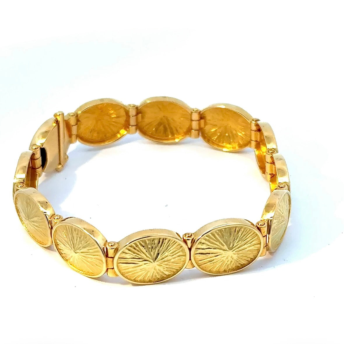 Solid designer bracelet by Fries Arauner in 18 karat (750) yellow gold