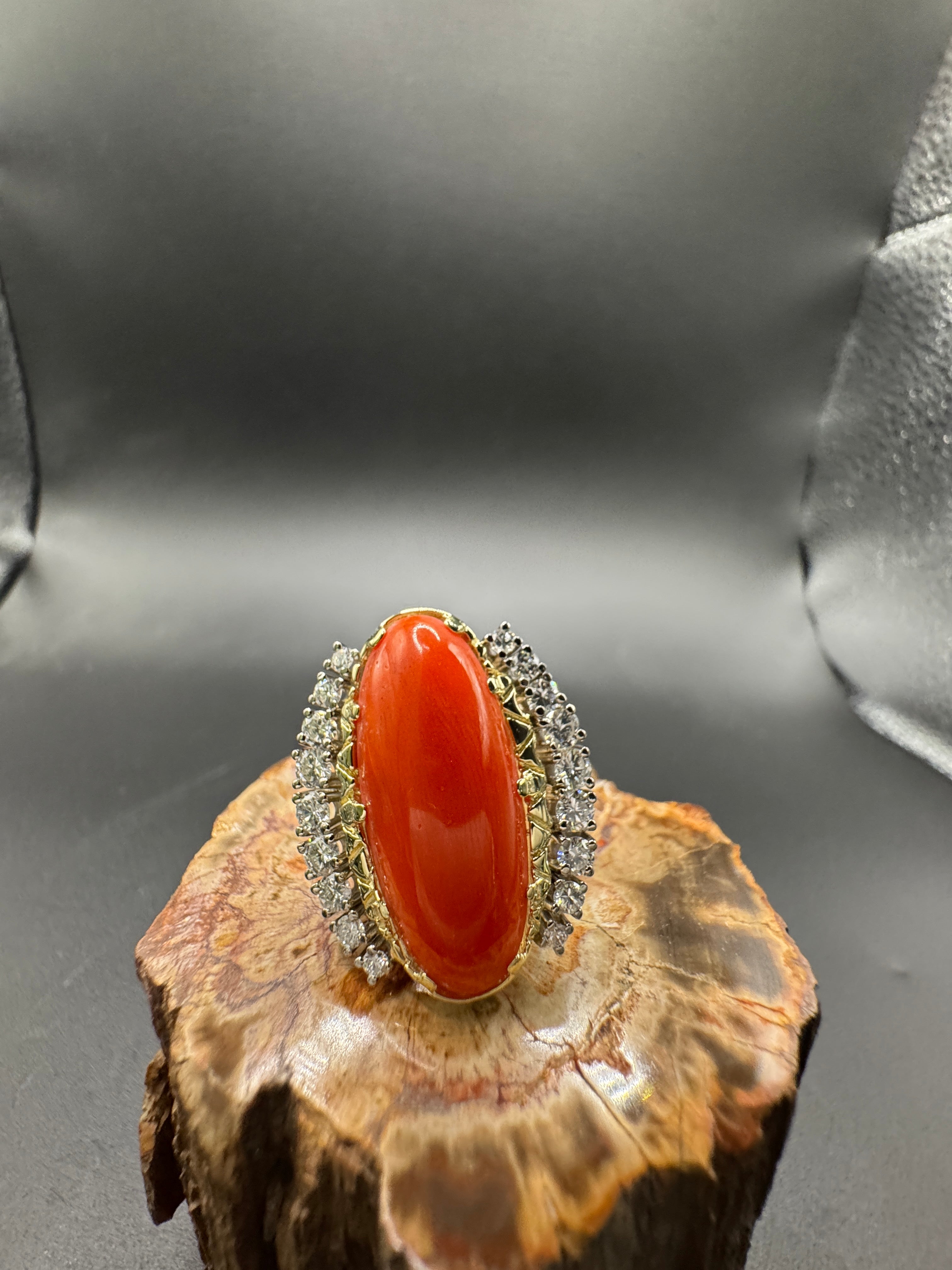 Extravagant cocktail ring in 14k yellow and white gold with fiery red coral and brilliant-cut diamonds