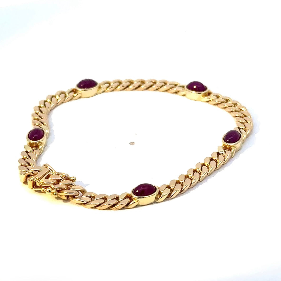 Zeitloses Armband in 14 Karat Gelbgold mit Rubin-Cabochons