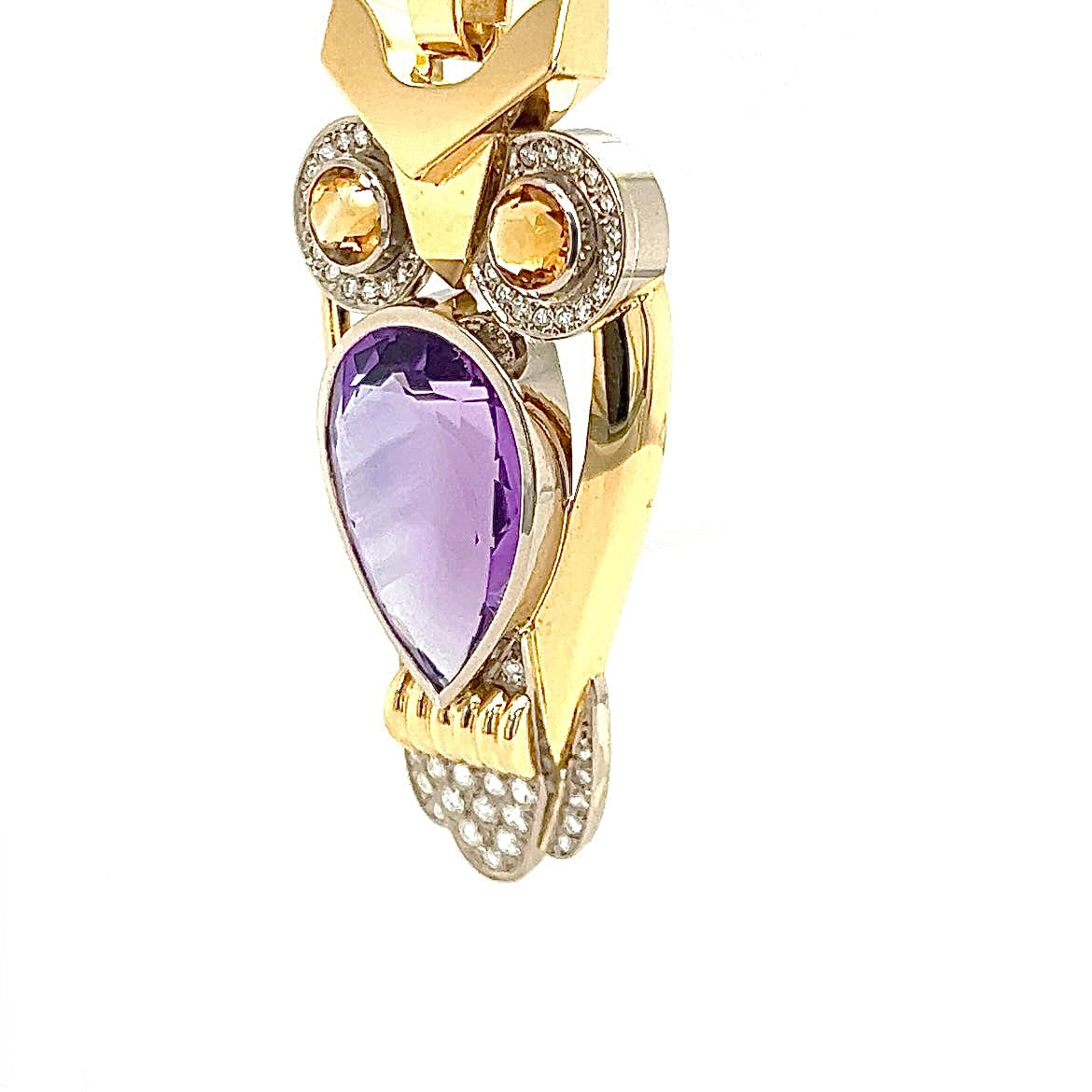 Fancy owl in 14 carat yellow and white gold with amethyst, citrine and diamonds