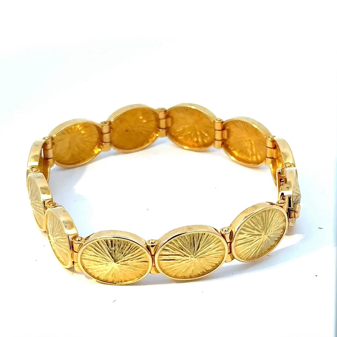 Solid designer bracelet by Fries Arauner in 18 karat (750) yellow gold