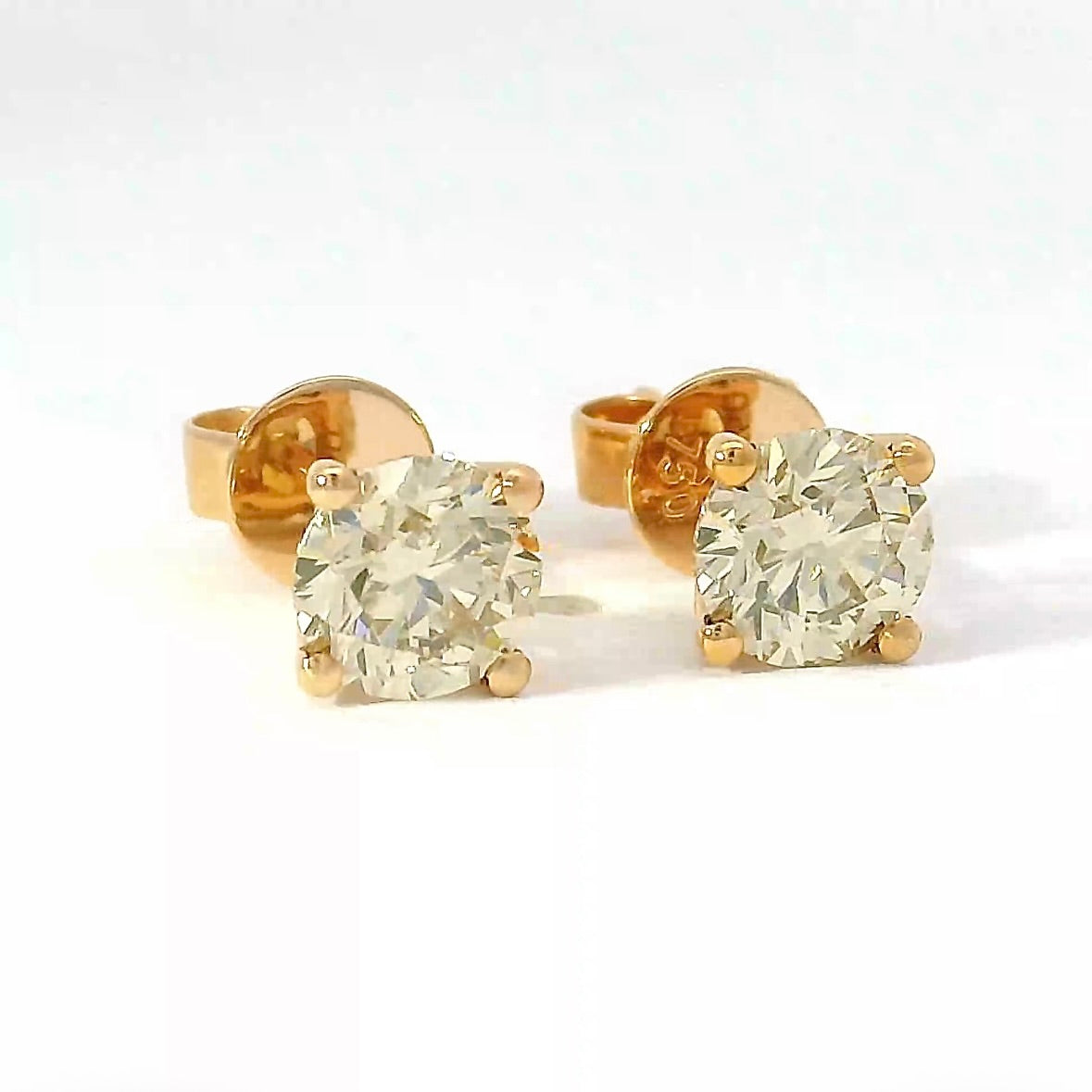 Elegante Ohrstecker in 18 Karat Roségold mit champagnerfarbenen Brillanten