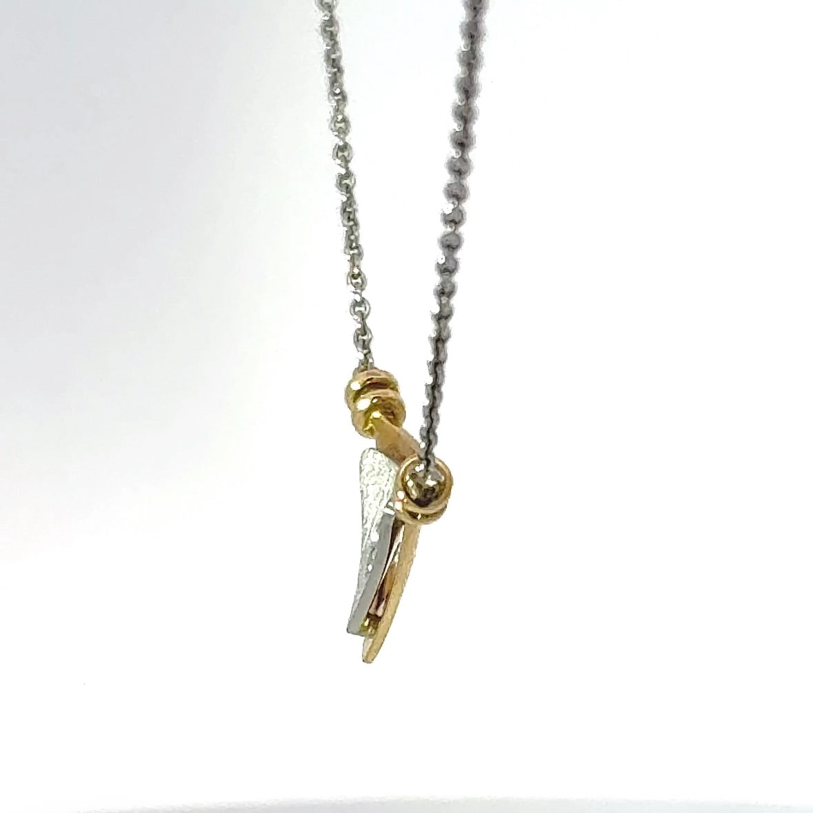 Elegantes Collier in 18 Karat Gelbgold und 950er Platin mit Brillant