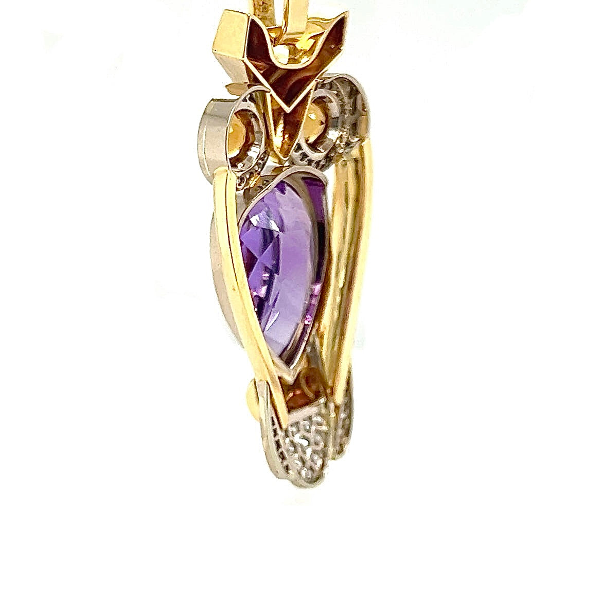 Fancy owl in 14 carat yellow and white gold with amethyst, citrine and diamonds
