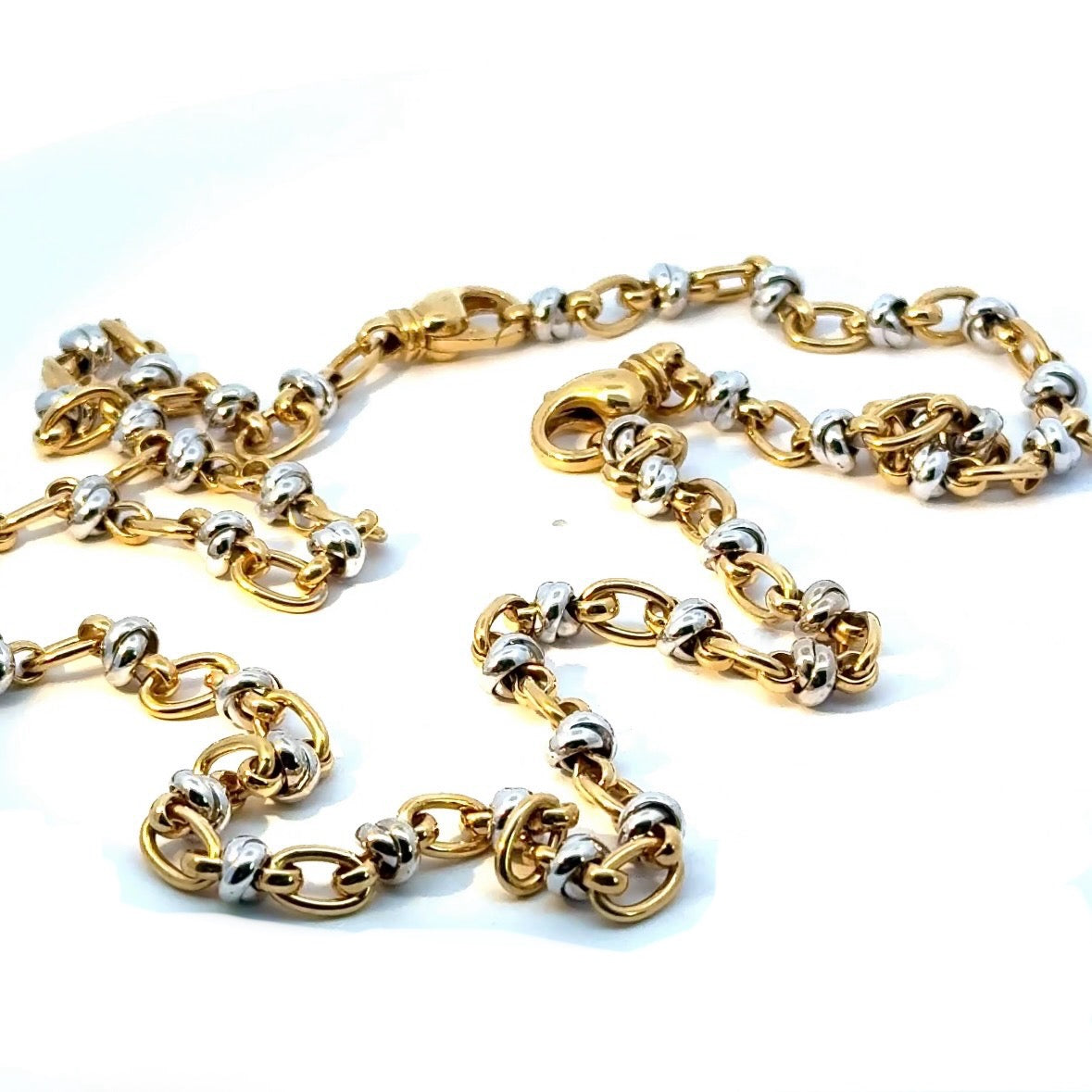 Ausgefallene Halskette in 18 Karat Gelb- und Weißgold mit Armband