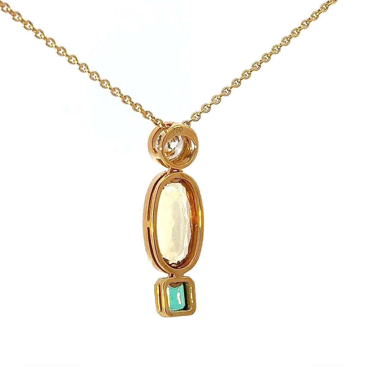 Modern pendant in 18K yellow gold with brilliant-cut diamond, emerald & heliodor