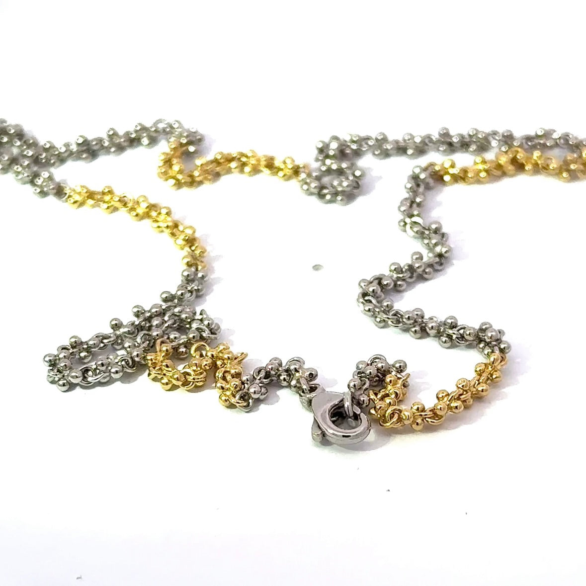 Ausgefallene Halskette in 18 Karat Gelbgold und 950er Platin