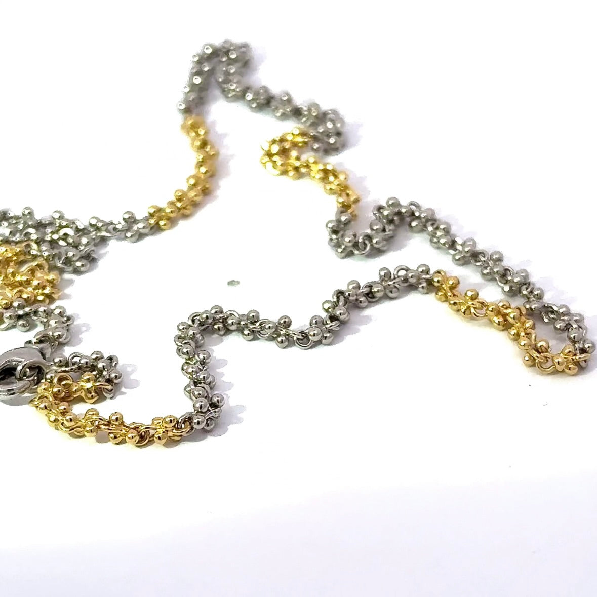Ausgefallene Halskette in 18 Karat Gelbgold und 950er Platin