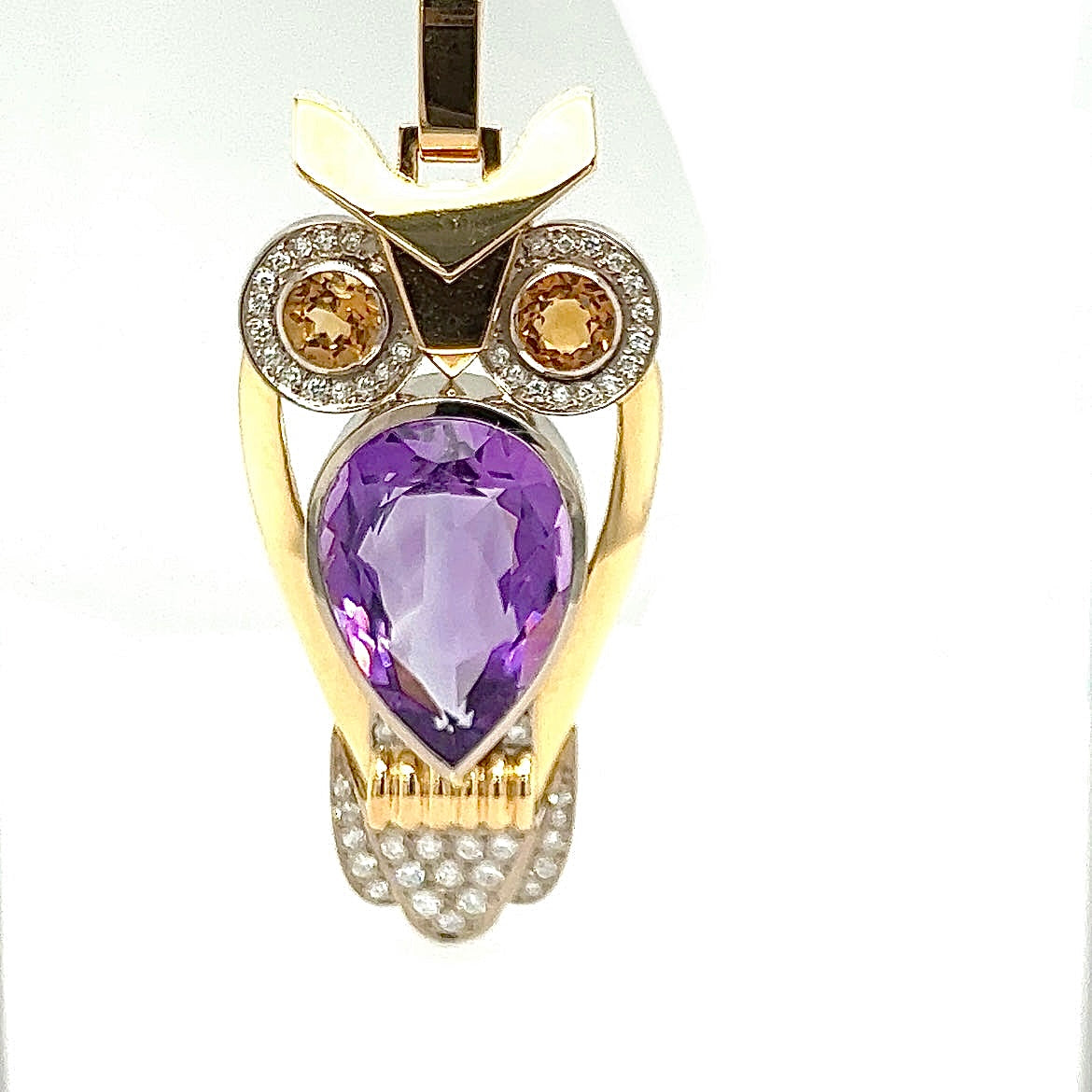 Fancy owl in 14 carat yellow and white gold with amethyst, citrine and diamonds