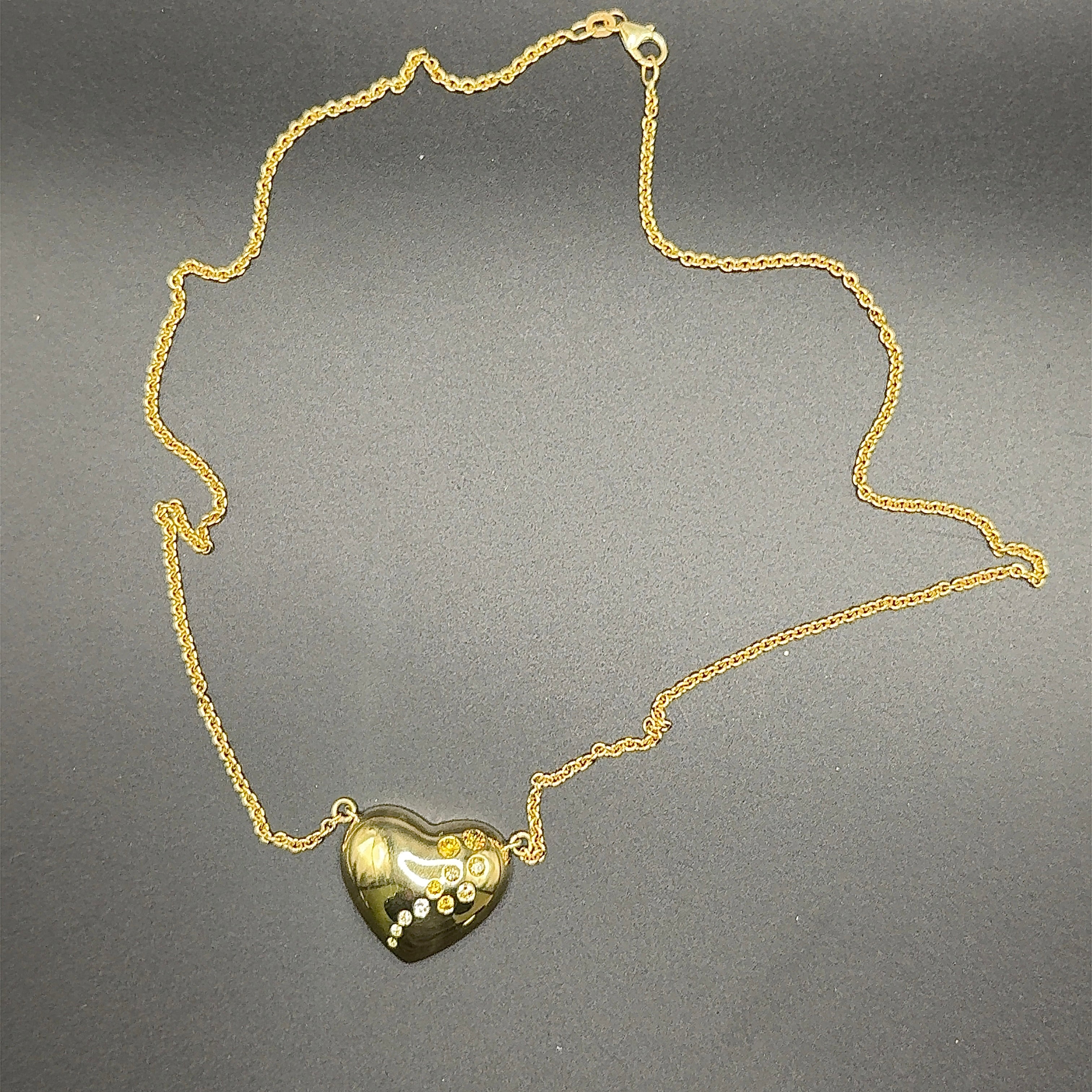 Hartenketting in 18 karaat geelgoud met natuurlijk gekleurde diamanten, met ketting in 14 karaat