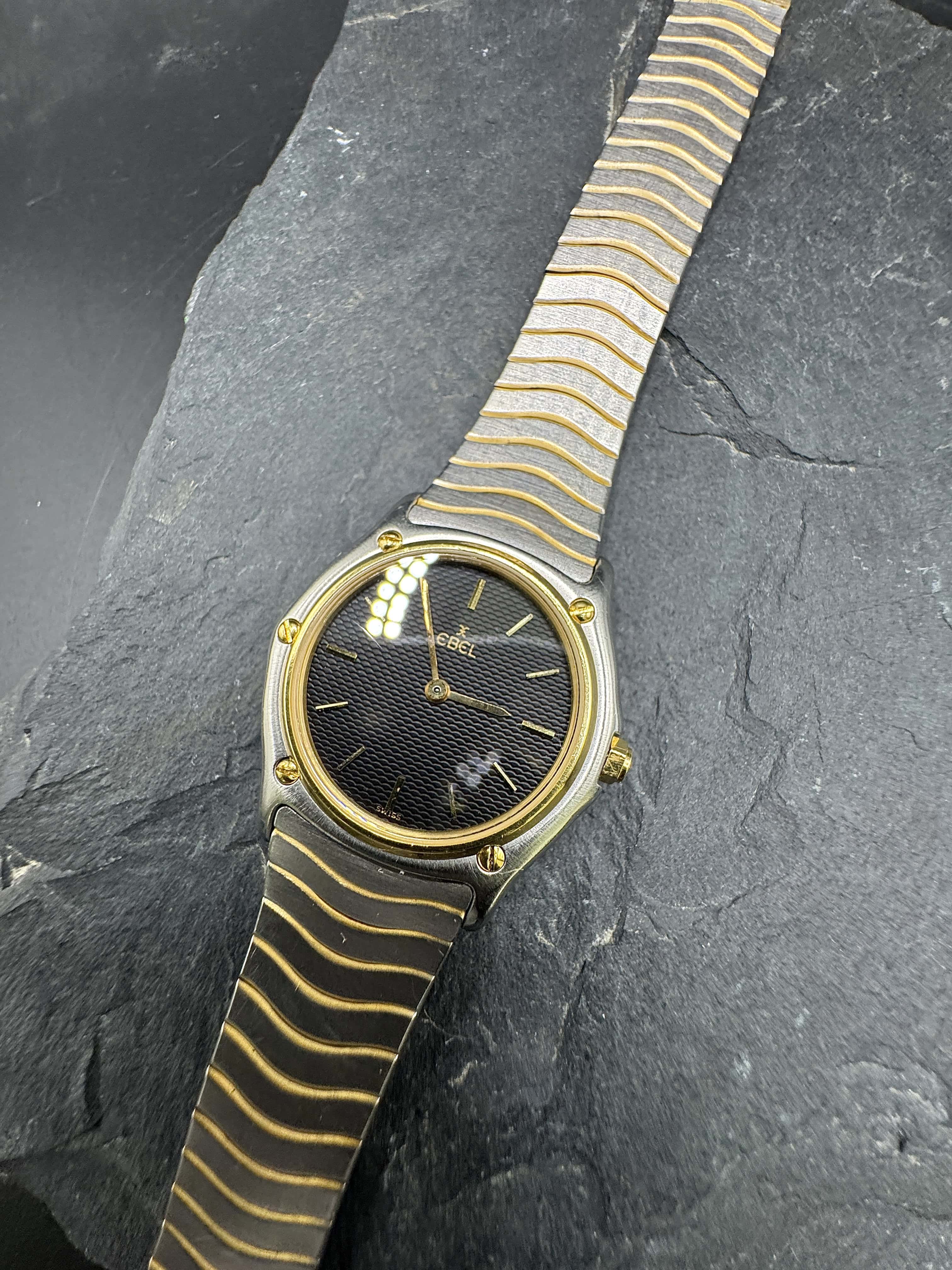 Ebel Sport Classique Damenuhr in Gold/Stahl mit schwarzem Zifferblatt