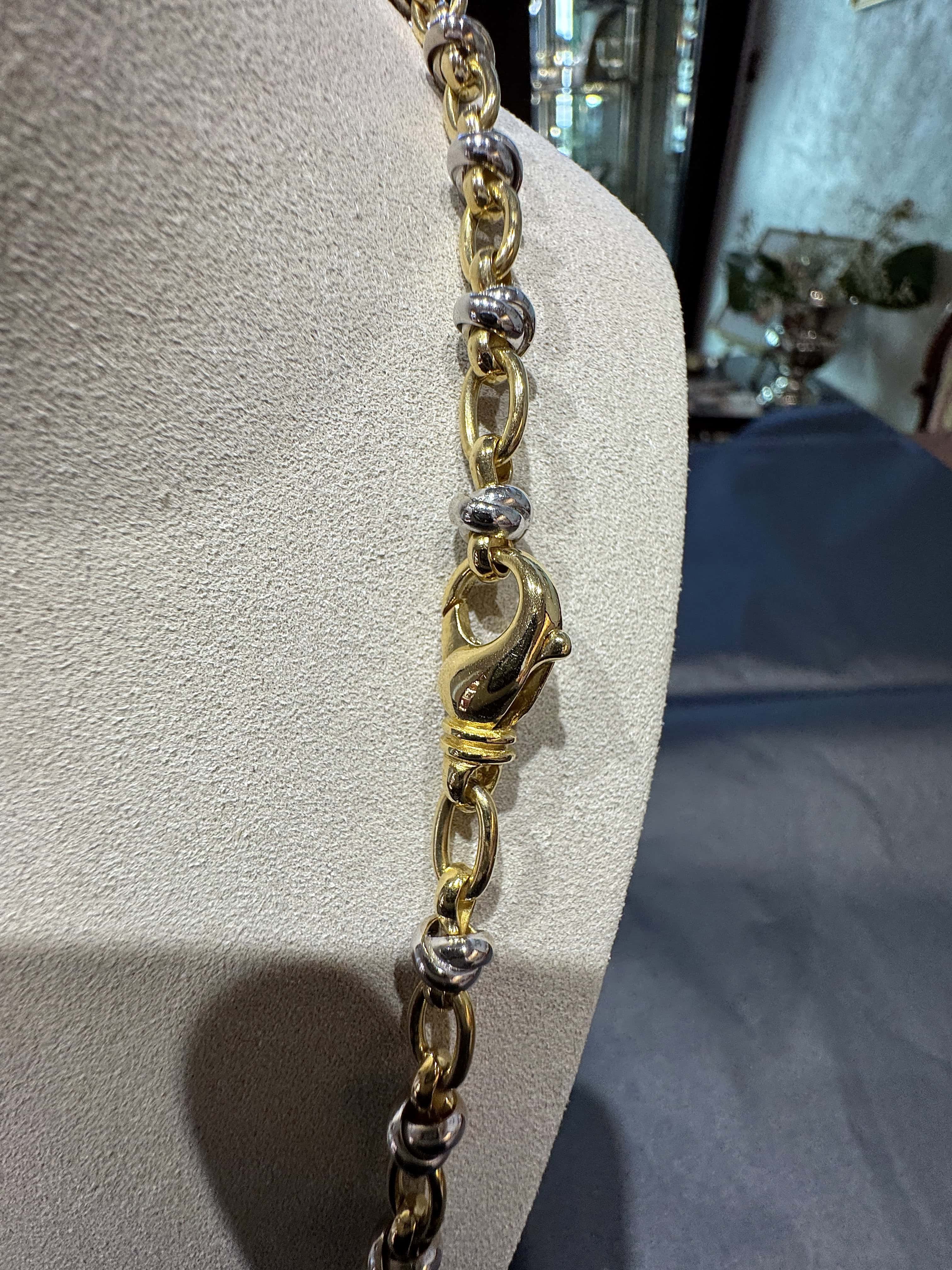 Ausgefallene Halskette in 18 Karat Gelb- und Weißgold mit Armband