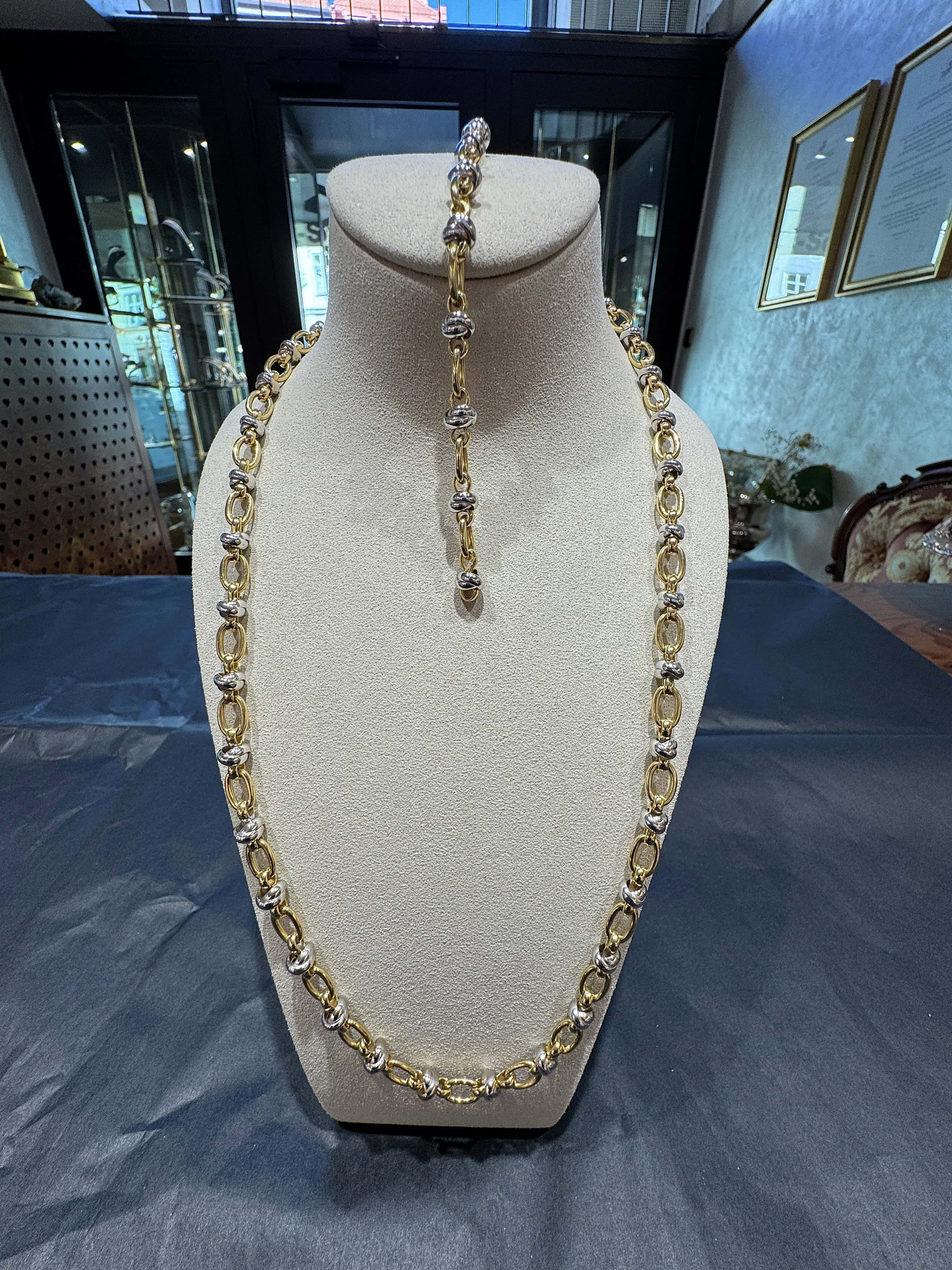 Ausgefallene Halskette in 18 Karat Gelb- und Weißgold mit Armband