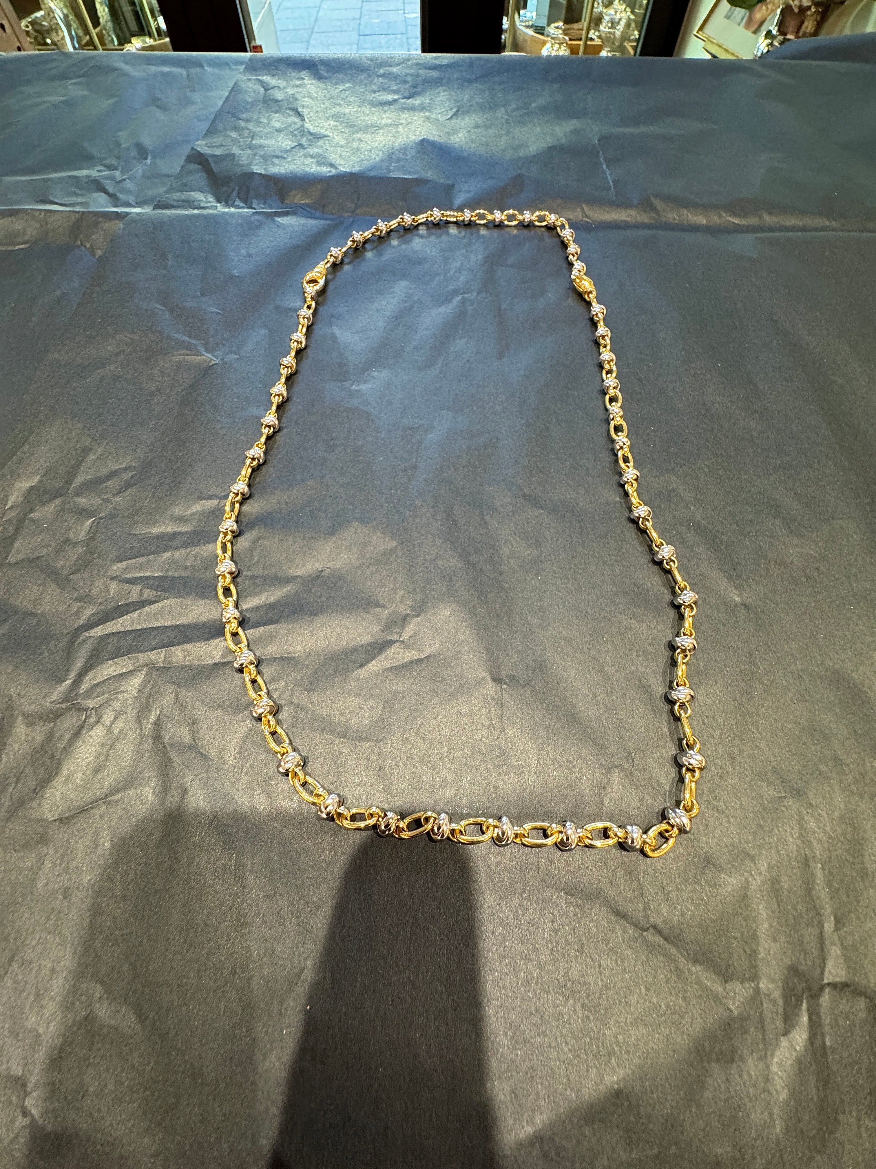 Ausgefallene Halskette in 18 Karat Gelb- und Weißgold mit Armband