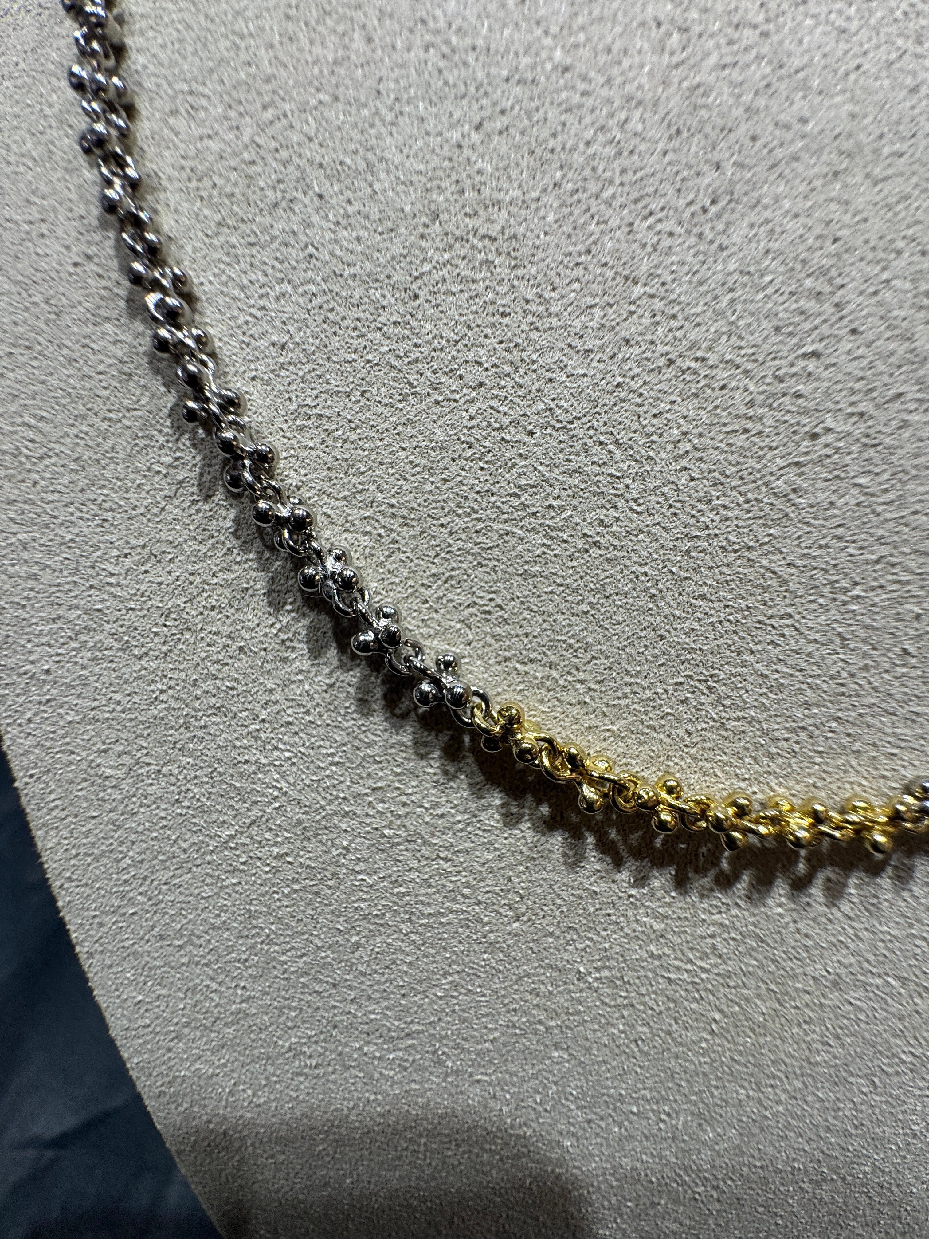 Ausgefallene Halskette in 18 Karat Gelbgold und 950er Platin