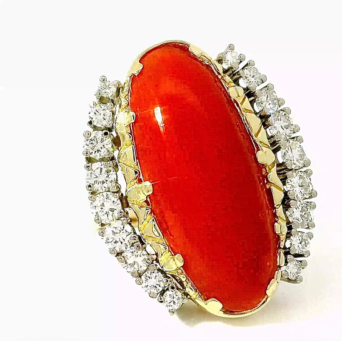 Extravagant cocktail ring in 14k yellow and white gold with fiery red coral and brilliant-cut diamonds