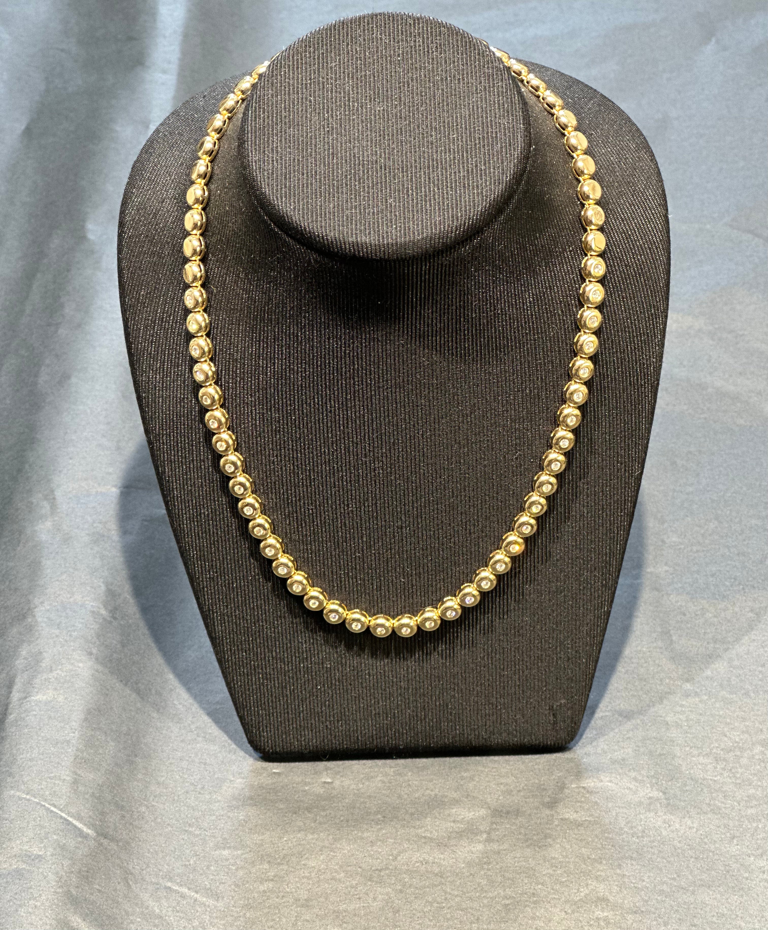 Tijdloze ketting van 14 karaat geelgoud met briljant geslepen diamanten
