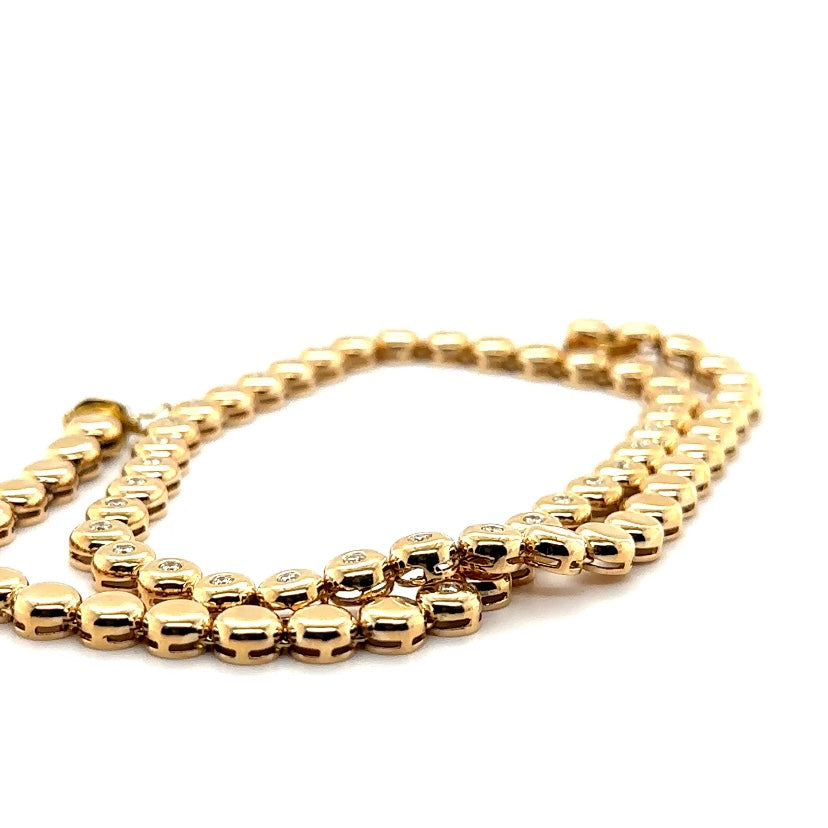 Tijdloze ketting van 14 karaat geelgoud met briljant geslepen diamanten