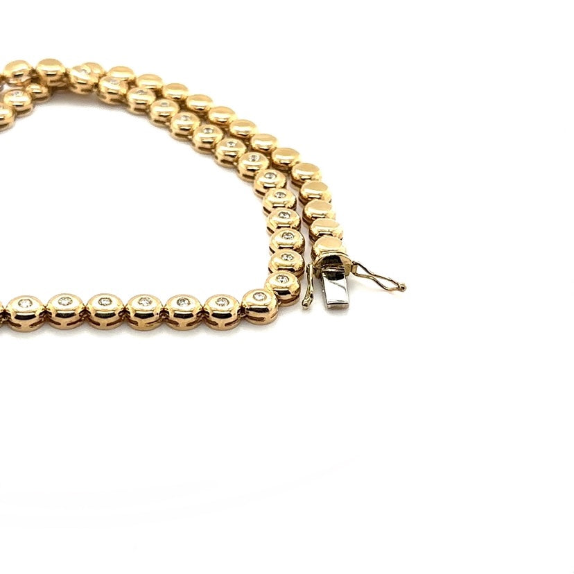 Tijdloze ketting van 14 karaat geelgoud met briljant geslepen diamanten
