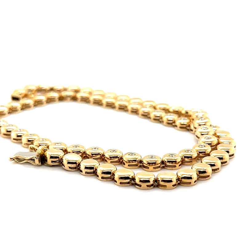 Tijdloze ketting van 14 karaat geelgoud met briljant geslepen diamanten