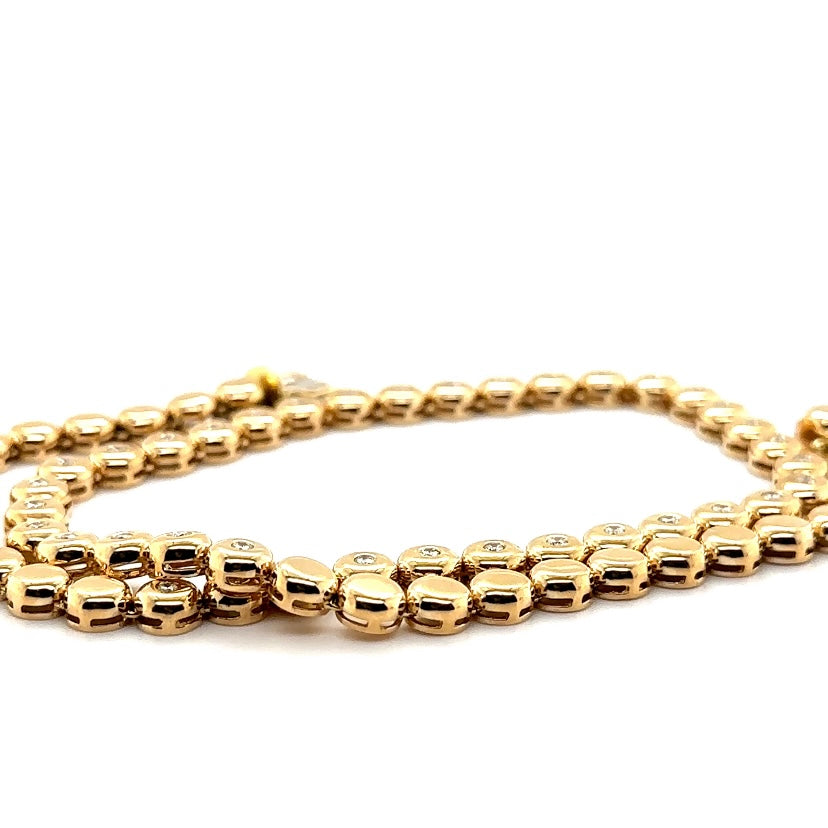 Tijdloze ketting van 14 karaat geelgoud met briljant geslepen diamanten