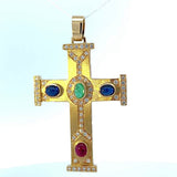 Beeindruckendes Kreuz in 18 Karat Gelbgold mit Brillanten, Smaragd, Rubin & Saphiren