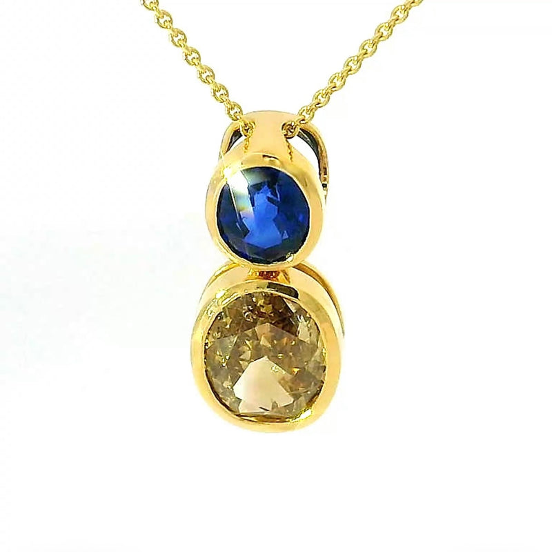 Edler Anhänger in 18 Karat Gelbgold mit hochfeinem Saphir & Fancy Brillant