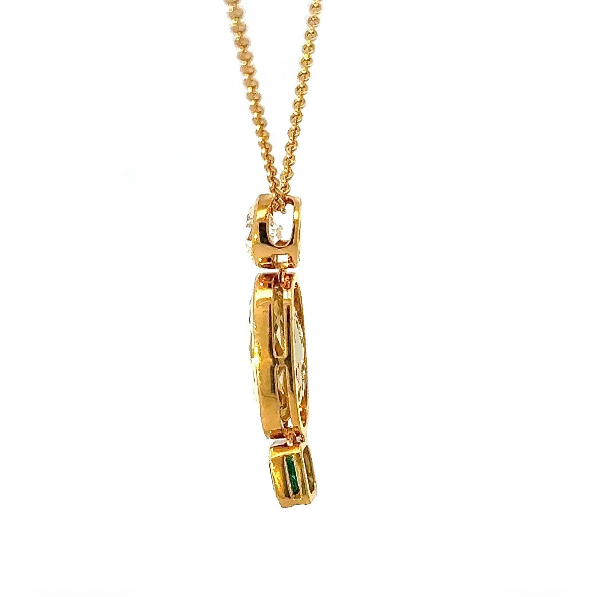 Modern pendant in 18K yellow gold with brilliant-cut diamond, emerald & heliodor