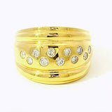 Leuchtender Ring in 18 Karat Gelbgold mit feinsten Brillanten