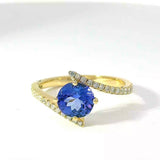Moderner Ring in 14 Karat Gelbgold mit hochfeinem Tansanit & Brillanten