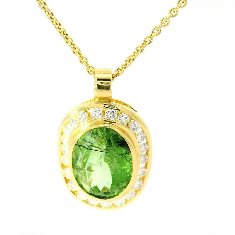 Edler Anhänger in 18 Karat Gelbgold mit großem Peridot & Brillanten