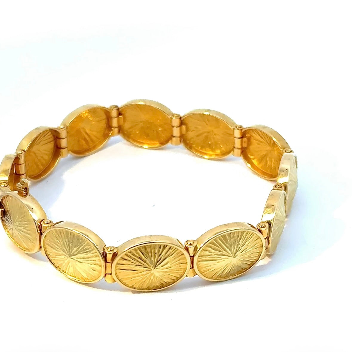 Solid designer bracelet by Fries Arauner in 18 karat (750) yellow gold