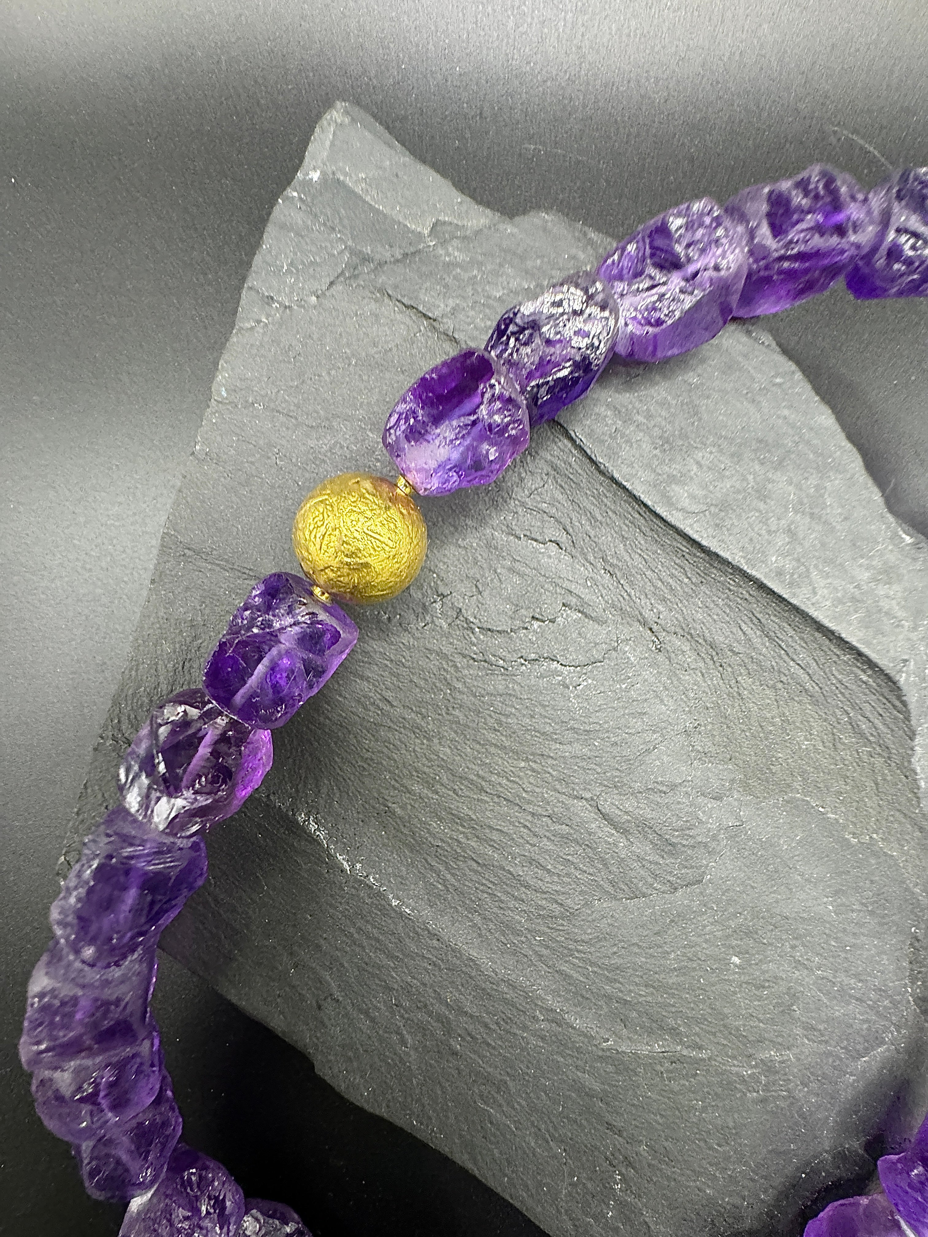 Fancy necklace made of fine amethysts with 18 carat gold clasp