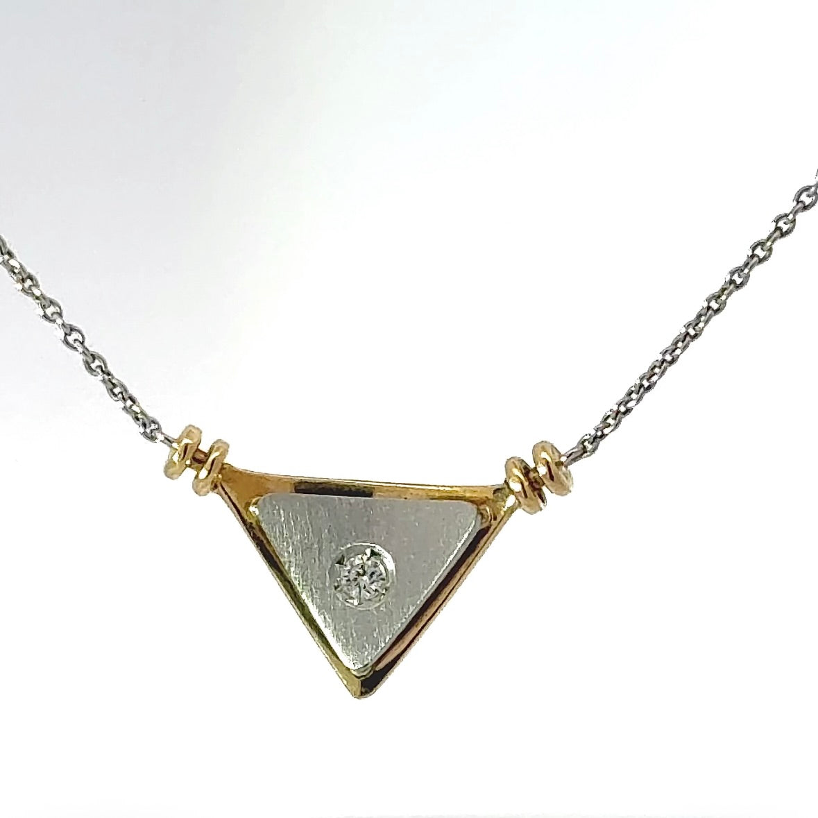 Elegantes Collier in 18 Karat Gelbgold und 950er Platin mit Brillant