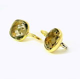 Elegante Kreolen in 18 Karat Gelbgold mit lebhaften Rauchquarzen