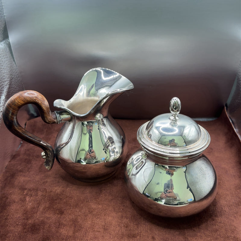 Elegant Italiaans zilveren servies uit de jaren 40 in 800 zilver met elegante houten handgrepen