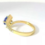 Moderner Ring in 14 Karat Gelbgold mit hochfeinem Tansanit & Brillanten