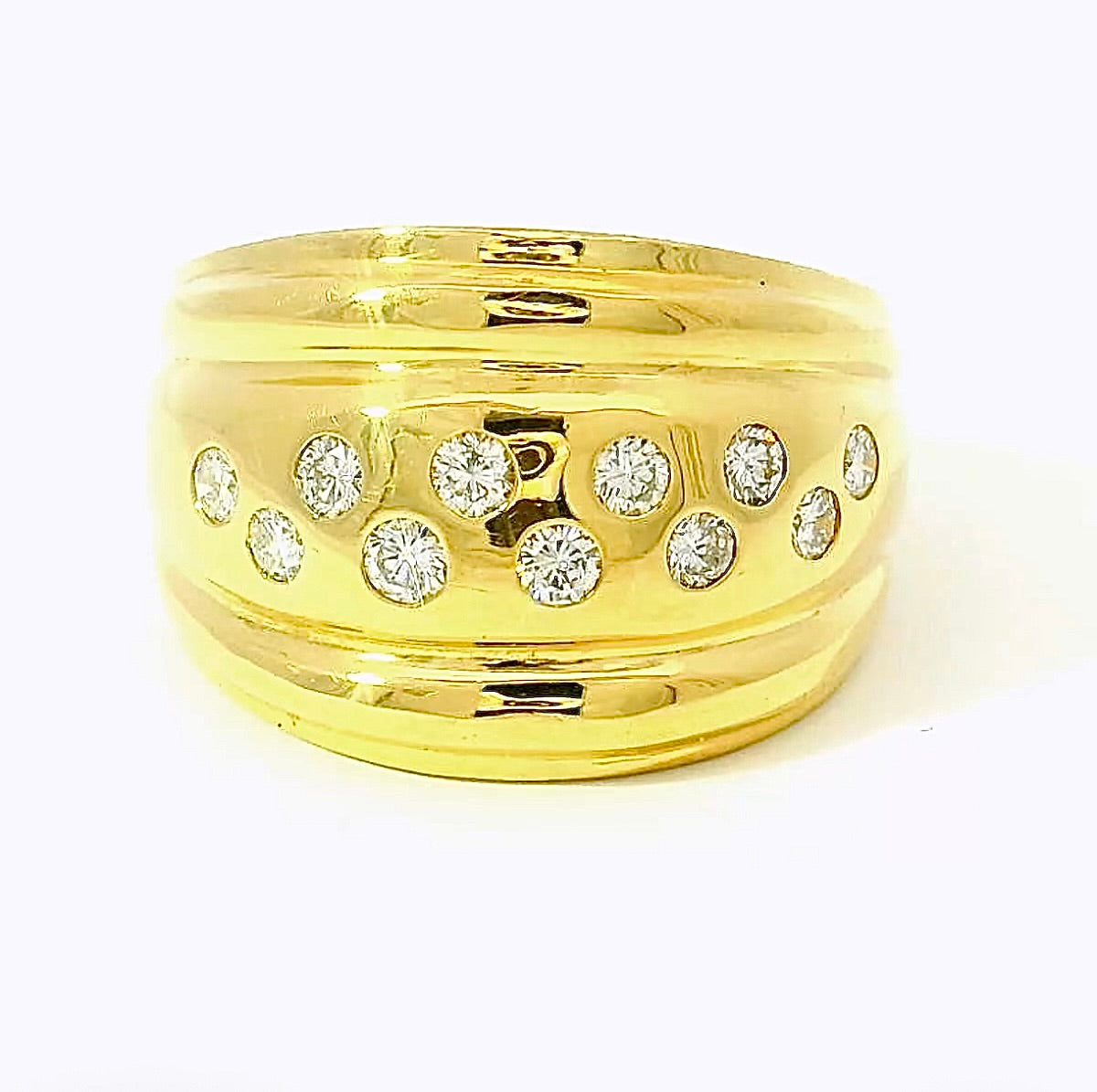 Leuchtender Ring in 18 Karat Gelbgold mit feinsten Brillanten