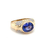 Stilvoller Ring in 14 Karat Gelbgold mit feinen Tansanit und Brillanten