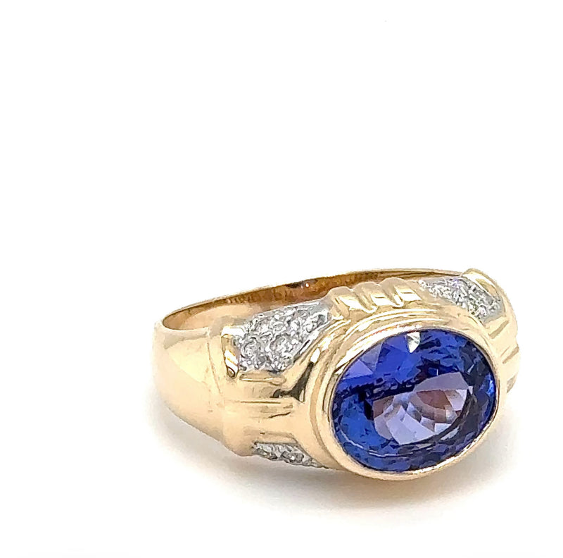 Stilvoller Ring in 14 Karat Gelbgold mit feinen Tansanit und Brillanten