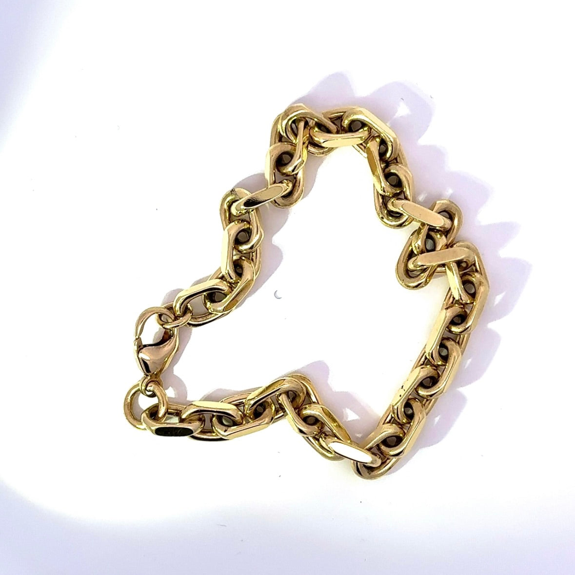 Heavy diamond-cut bracelet in 14 karat yellow gold with lobster clasp