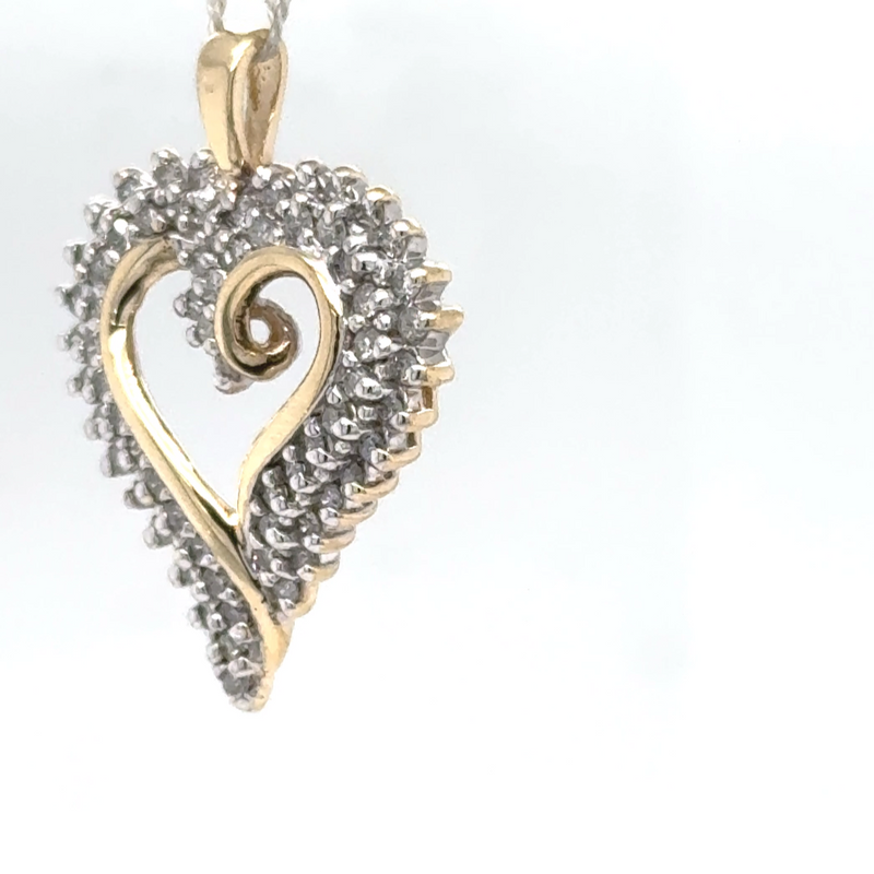 Elegant bicolor heart in 10 carat gold with 67 diamonds