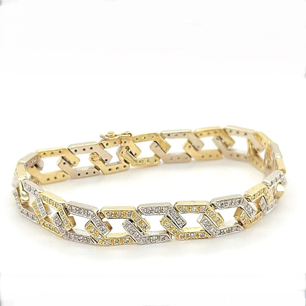 Impressive vintage bracelet in 14 carat bicolor with 209 diamonds 