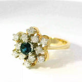 Verspielter Ring in 14 Karat Gelb- und Weißgold mit Saphir & Brillanten