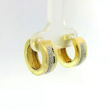 Zeitlose Kreolen in 14 Karat Gelbgold mit Diamanten