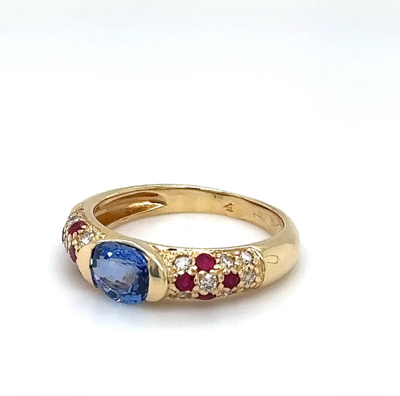 Edler Ring in 18 Karat Gelbgold mit hochfeinen Saphir, Brillanten & Rubine