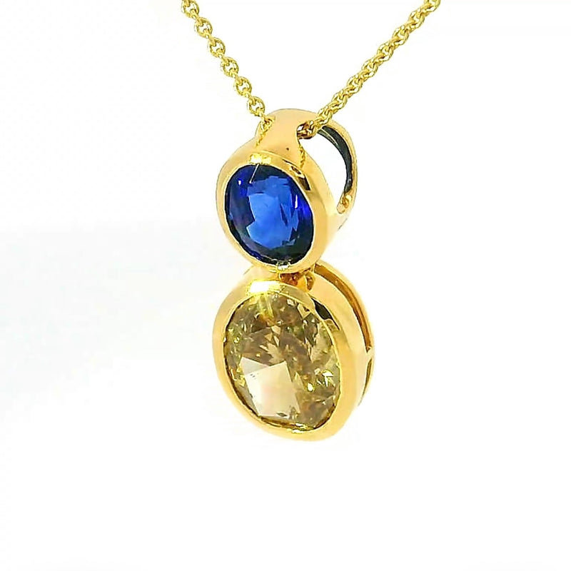 Edler Anhänger in 18 Karat Gelbgold mit hochfeinem Saphir & Fancy Brillant