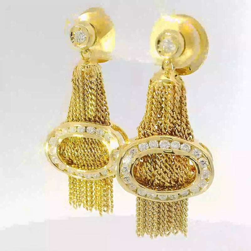 Außergewöhnliche Ohrringe in 18 Karat Gelbgold mit feinsten Brillanten