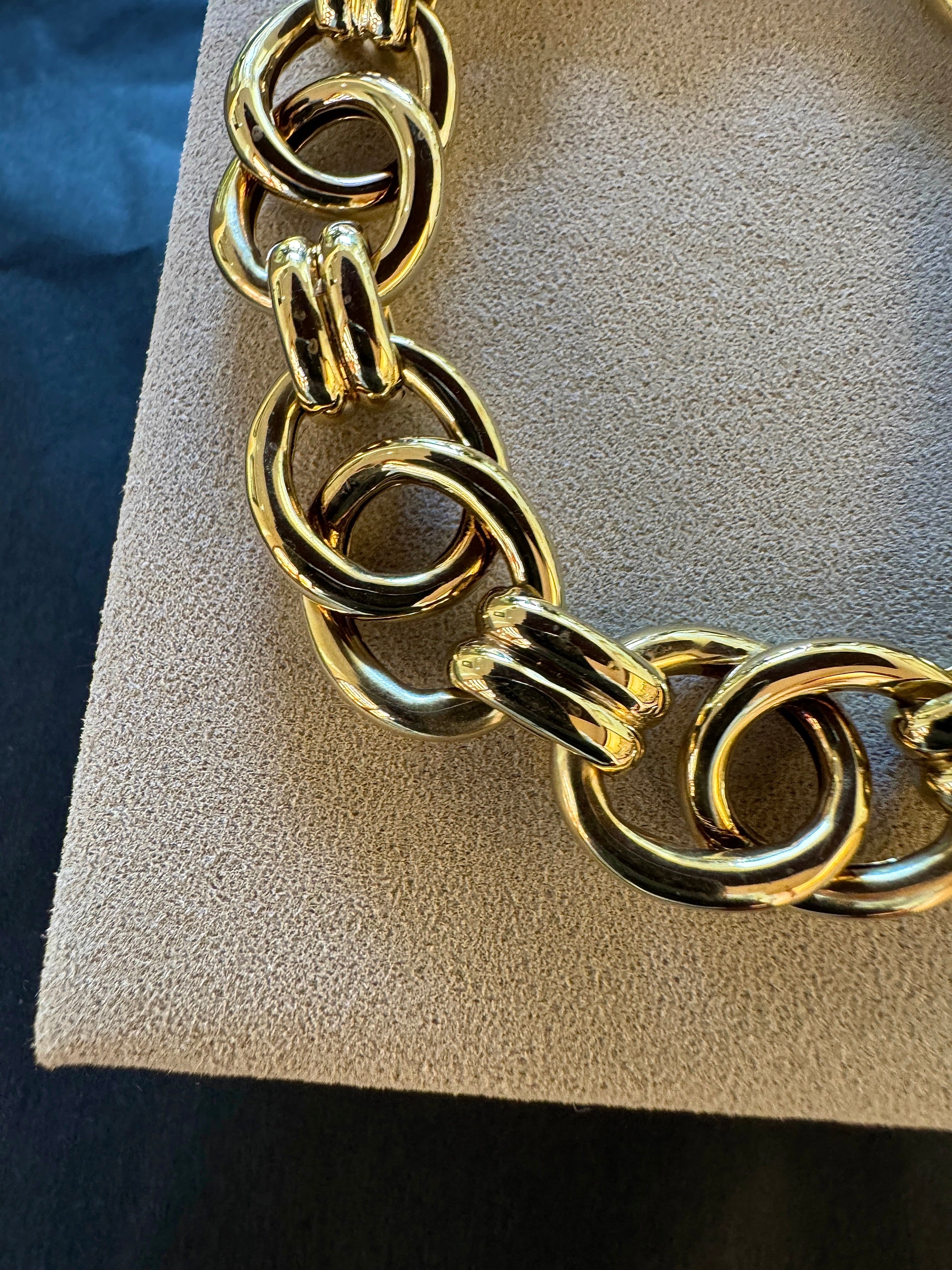 Wide 14 karat yellow gold bracelet with spring ring clasp