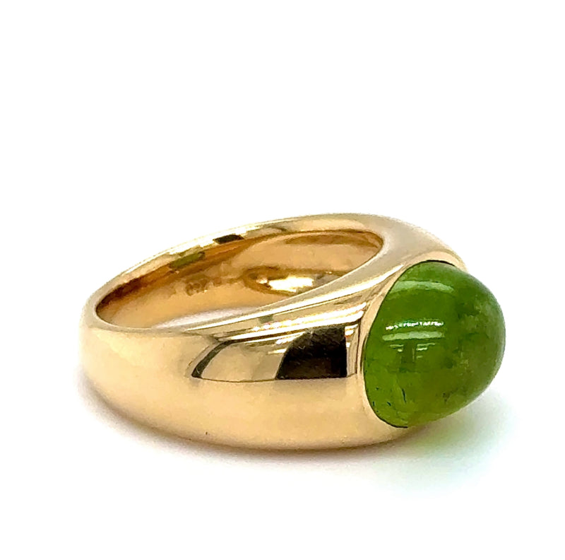 Massiver Ring in 18 Karat Gelbgold mit leuchtendem Peridot